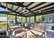 Screened outdoor kitchen with stainless steel appliances at 4239 Tom Point Rd, Hollywood, SC 29449