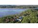 Waterfront estate nestled amongst tall trees with private dock access at 4239 Tom Point Rd, Hollywood, SC 29449