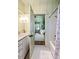 Elegant bathroom with subway tile, a clawfoot tub, and a view to the bedroom at 4239 Tom Point Rd, Hollywood, SC 29449