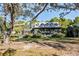 Charming two-story home with metal roof and large backyard at 4239 Tom Point Rd, Hollywood, SC 29449