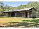 Spacious barn with multiple stalls and metal roof at 4239 Tom Point Rd, Hollywood, SC 29449