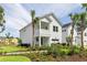 Two-story home with a charming front porch and landscaping at 295 Claret Cup Way, Charleston, SC 29414