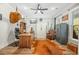 Spacious home office with wood desk and leather chair at 112 Canewood Ln, Ridgeville, SC 29472