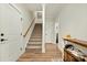 Staircase leading to the upper level with hardwood floors at 112 Canewood Ln, Ridgeville, SC 29472