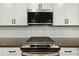 Stainless steel gas cooktop with microwave above at 112 Canewood Ln, Ridgeville, SC 29472