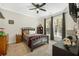 Charming bedroom with a dark wooden bed frame and Lego decor at 112 Canewood Ln, Ridgeville, SC 29472