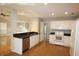 White kitchen with granite countertops and stainless steel appliances at 110 Smithfield Ave, Summerville, SC 29485