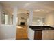 Kitchen with granite countertops, stainless steel dishwasher, and view of living room at 110 Smithfield Ave, Summerville, SC 29485