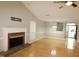 Bright living area with hardwood floors, fireplace and neutral walls at 110 Smithfield Ave, Summerville, SC 29485