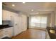 Kitchen with white cabinets, granite countertops and tile floor at 110 Smithfield Ave, Summerville, SC 29485