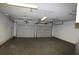 Two-car garage with concrete floor and ample storage at 110 Smithfield Ave, Summerville, SC 29485