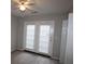 Bedroom with neutral walls, ceiling fan and door to outside at 110 Smithfield Ave, Summerville, SC 29485