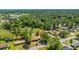 Aerial view of a house on a tree-lined street at 565 Estates Dr, Walterboro, SC 29488