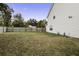 Spacious backyard with a wooden fence at 174 Education Blvd, Ladson, SC 29456