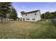 Spacious backyard with a fenced-in area and patio at 174 Education Blvd, Ladson, SC 29456