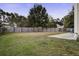 Fenced backyard with a patio and grassy area at 174 Education Blvd, Ladson, SC 29456
