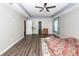 Spacious bedroom with ceiling fan and wood-look flooring at 127 Meadow Wood Rd, Summerville, SC 29486