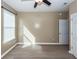 Bright bedroom with ceiling fan, window blinds, and wood-look flooring at 127 Meadow Wood Rd, Summerville, SC 29486