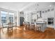 Open kitchen with island seating and hardwood floors at 2312 Bucktail Ct, Mount Pleasant, SC 29466