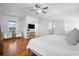 Main bedroom with hardwood floors, a sitting area, and access to a balcony at 2312 Bucktail Ct, Mount Pleasant, SC 29466