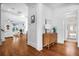 Bright entryway with hardwood floors and access to living room and bathroom at 2312 Bucktail Ct, Mount Pleasant, SC 29466