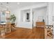 Bright dining room with hardwood floors, a round table, and rattan chairs at 2312 Bucktail Ct, Mount Pleasant, SC 29466