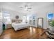 Spacious primary bedroom with hardwood floors and access to a private balcony at 2312 Bucktail Ct, Mount Pleasant, SC 29466