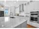 Modern kitchen with white cabinets, granite counters and stainless steel appliances at 2312 Bucktail Ct, Mount Pleasant, SC 29466