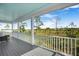 Covered balcony overlooking marsh views, featuring a wooden floor at 2312 Bucktail Ct, Mount Pleasant, SC 29466