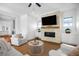 Living room featuring hardwood floors, a fireplace and white sofas at 2312 Bucktail Ct, Mount Pleasant, SC 29466