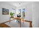 Home office with hardwood floors, a light wood desk, and French doors leading to balcony at 2312 Bucktail Ct, Mount Pleasant, SC 29466