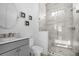 Modern bathroom with a large walk-in shower and gray vanity at 2312 Bucktail Ct, Mount Pleasant, SC 29466