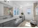 Elegant bathroom with double vanity, large shower, and marble countertops at 2312 Bucktail Ct, Mount Pleasant, SC 29466