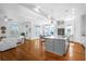 Open concept kitchen with large island and hardwood floors at 2312 Bucktail Ct, Mount Pleasant, SC 29466