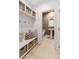 Stylish powder room with white pedestal sink and a blush-toned wall at 483 Queenview Ln, Charleston, SC 29414