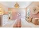 Charming bedroom with a blush pink wall and a comfortable bed at 483 Queenview Ln, Charleston, SC 29414