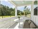 Private balcony with outdoor furniture and a view of the trees at 483 Queenview Ln, Charleston, SC 29414