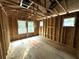 New home interior framing with windows at 974 Dusk Dr, Summerville, SC 29486