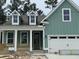 Two-story craftsman home with gray siding and a white garage at 369 Wappoo Trace Ln, Summerville, SC 29486