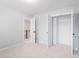 Spacious bedroom with neutral walls and an open door to hallway at 364 Wappoo Trace Ln, Summerville, SC 29486