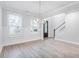 Bright dining room with hardwood floors and chandelier at 364 Wappoo Trace Ln, Summerville, SC 29486