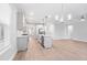 Open kitchen boasts modern appliances and an island at 364 Wappoo Trace Ln, Summerville, SC 29486