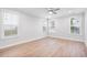 Bright bedroom with hardwood floors and multiple windows at 364 Wappoo Trace Ln, Summerville, SC 29486