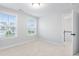 Well-lit bedroom with carpet and two windows at 364 Wappoo Trace Ln, Summerville, SC 29486
