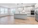 Modern kitchen with island, stainless steel appliances, and white cabinets at 364 Wappoo Trace Ln, Summerville, SC 29486
