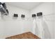 Spacious walk-in closet with wire shelving and wood floor at 367 Wappoo Trace Ln, Summerville, SC 29486