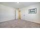 Bright bedroom featuring neutral walls and carpet, and double door entry at 487 Pender Woods Dr, Summerville, SC 29486