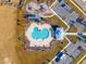 Community pool with adjacent playground and clubhouse at 487 Pender Woods Dr, Summerville, SC 29486