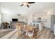 Open concept dining area with wood table and kitchen views at 487 Pender Woods Dr, Summerville, SC 29486