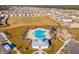 Community pool with adjacent playground and clubhouse at 487 Pender Woods Dr, Summerville, SC 29486